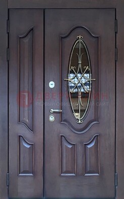 Темная металлическая дверь Винорит со стеклом и ковкой ДСК-239 в Железнодорожном