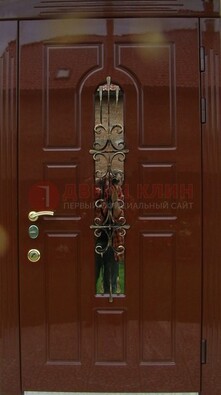 Красивая металлическая дверь со стеклом и ковкой ДСК-33 в Железнодорожном